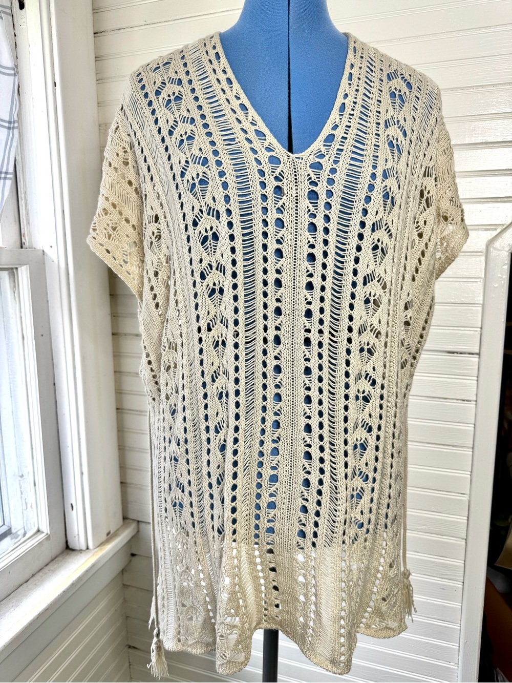Woman’s crocheted poncho